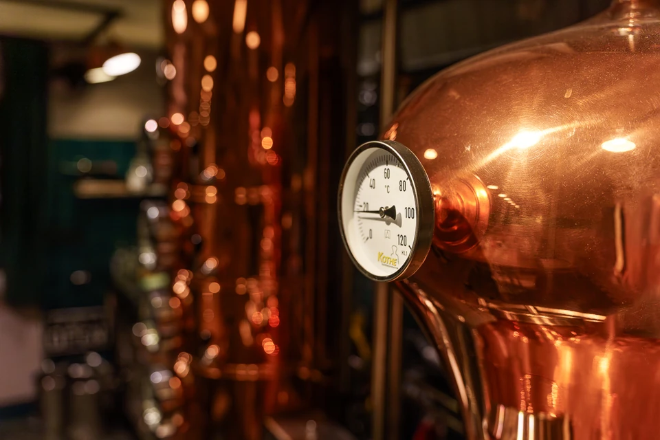 Copper surfaces and a close detail of a distilling apparatus