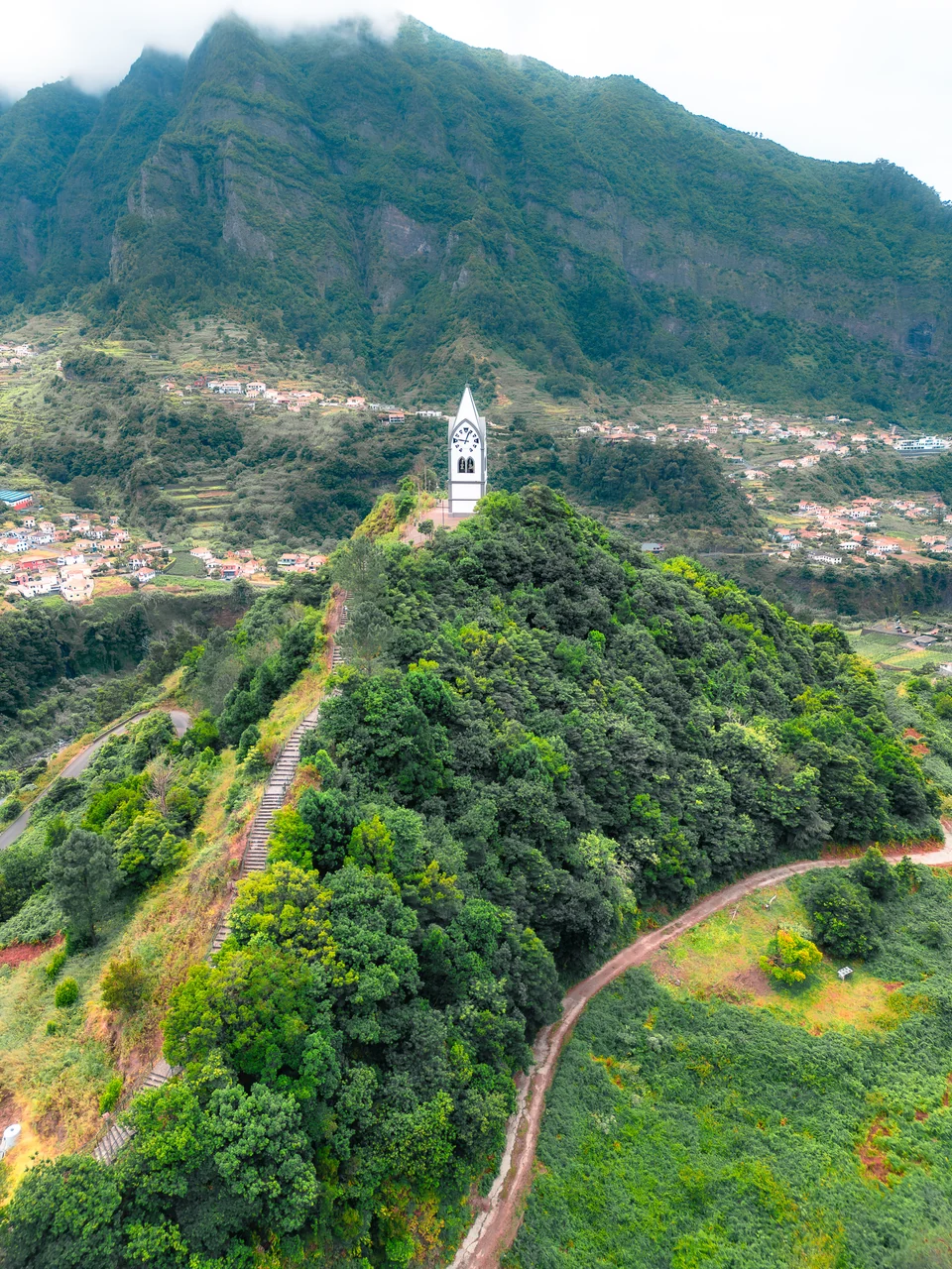 White church on a green ridge