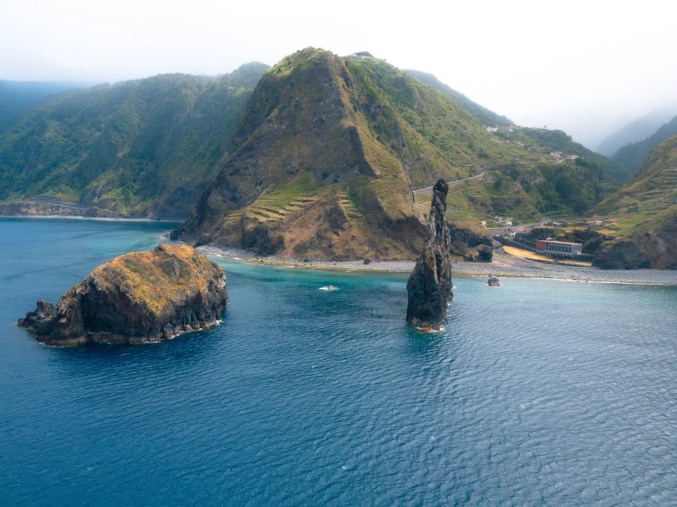 Sea stacks and a rugged coastline in the blue Atlantic