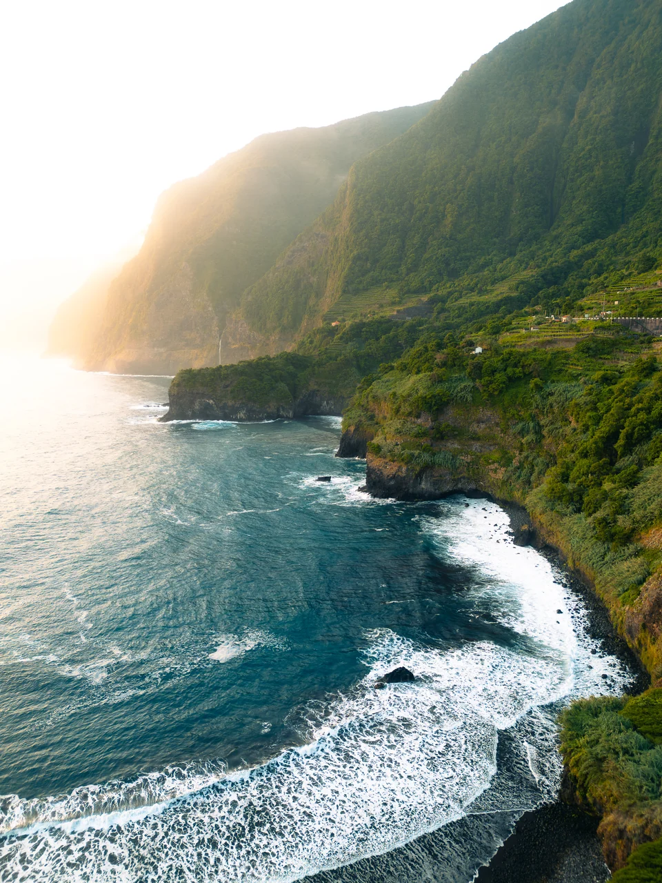 Evening light over steep cliffs and Atlantic waves